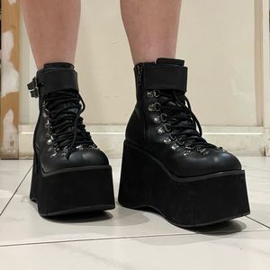 Black lace-up platform Demonia ankle boots (Kera-21) in size 8
